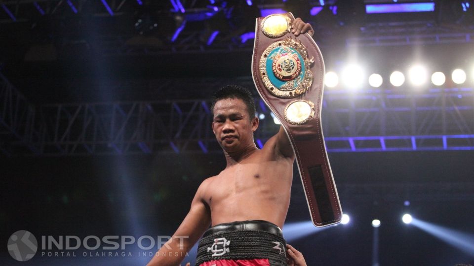 Daud Yordan berhasil menyabet gelar WBO Intercontinental dan WBC Asia International Challenge Belt di Thailand. Copyright: © Herry Ibrahim/INDOSPORT